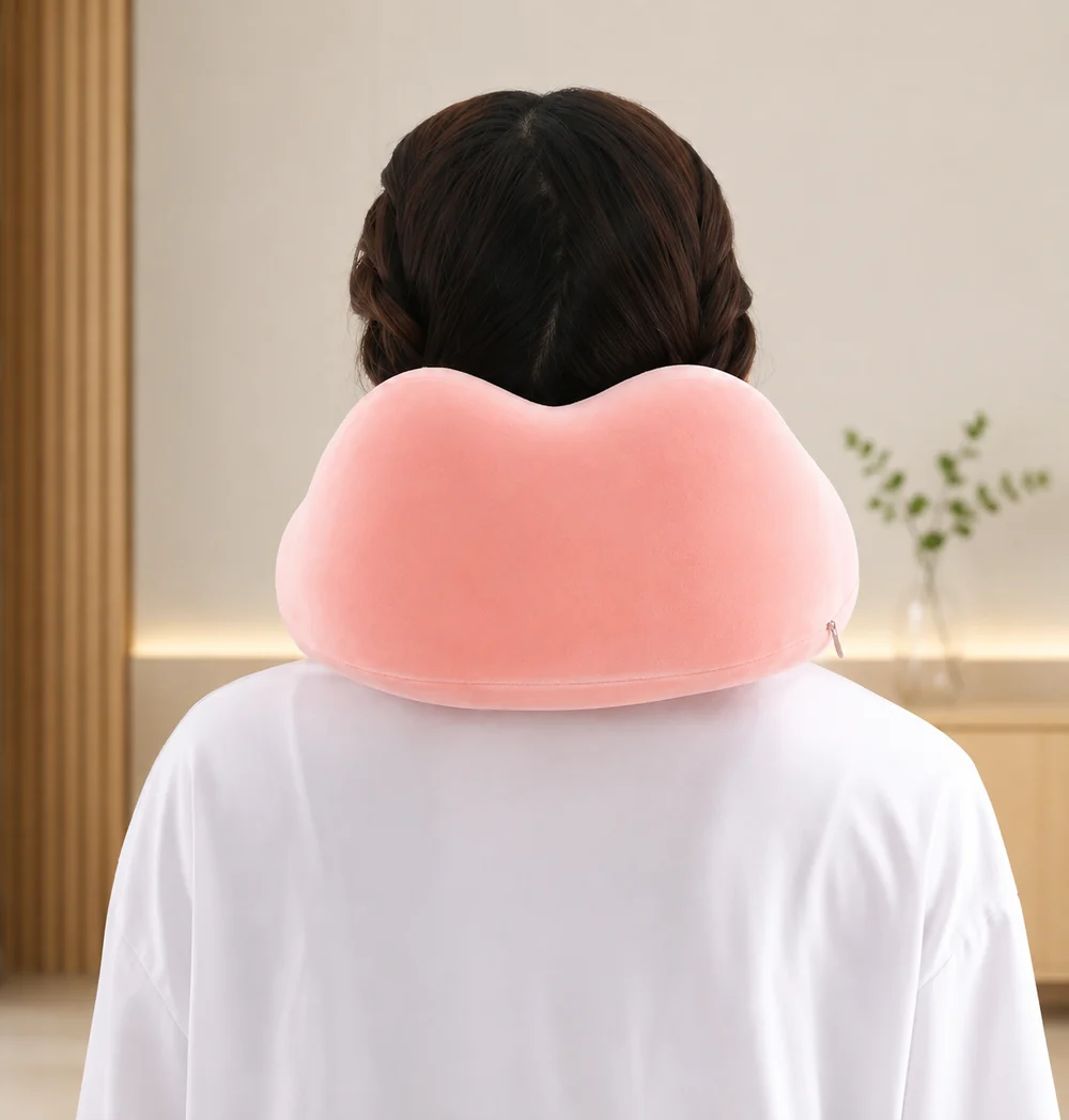 The Cradleform travel pillow seen from behind, worn around the neck